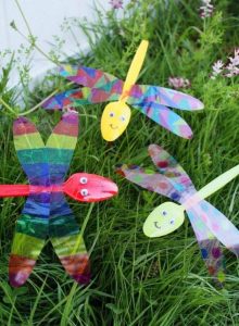 Plastic spoon dragon flies – garden art for children.