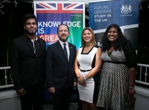 British High Commissioner Tim Stew (second from left) and members of the organising committee of the One Young World Caribbean Caucus