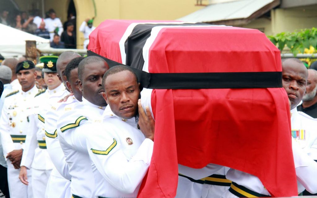 Members of the Trinidad and Tobago Defence Force carrying the casket bearing the body of  Lance Cpl. Marcus Gay, 31 who was shot and killed at Fifth Company, Moruga. The funeral took place at the Siparia Anglician Church, Siparia.