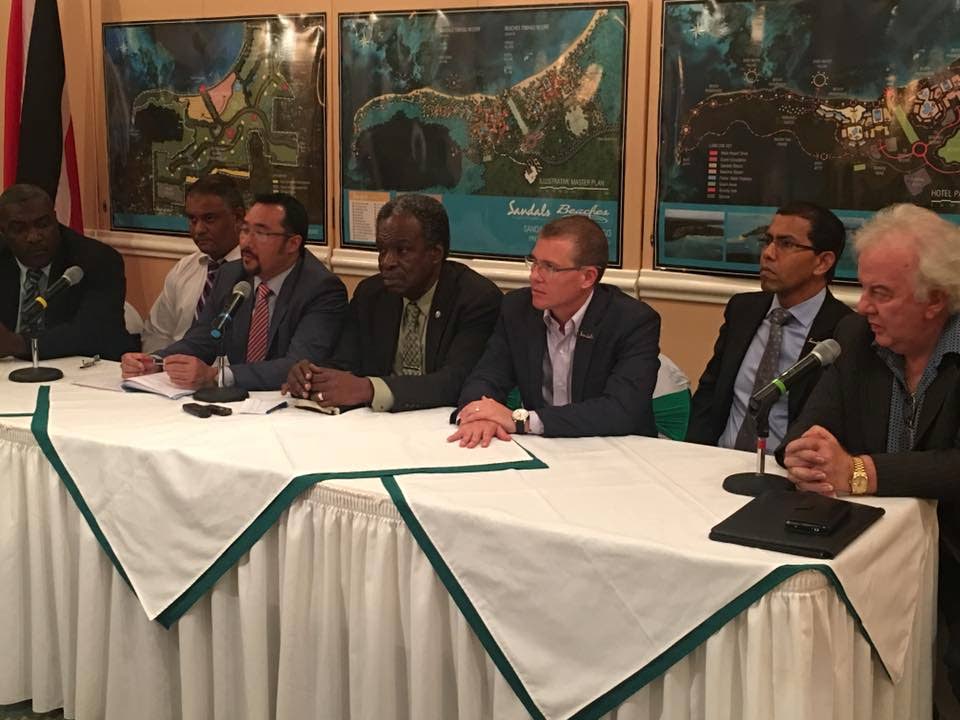 Former Tobago House of Assembly (THA) Chief Secretary Orville London, centre, and Minister in the Office of the Prime Minister Stuart Young, left, along with Sandals CEO Adam Stewart, address other stakeholders at a consultation on the proposed sandals resort in Tobago in September 2016.