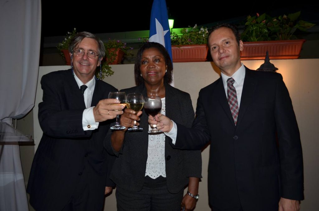Saluting the three nations are Fernando Schmidt, Ambassador of Chile from left, Jennifer Daniel, PS — Ministry of Foreign and CARICOM 
Affairs, and Jesús López-Gonzáles, Ambassador of Mexico.