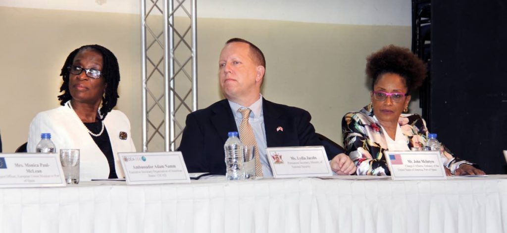 From left is Lydia Jacobs (PS National Security Ministry), John McIntyre (US Embassy) and Beverly Reynolds (Manager Caricome Secreteriat) at the opening ceremony of the regional seminal on drug treatment and information at the Police Training Academy in St. James.