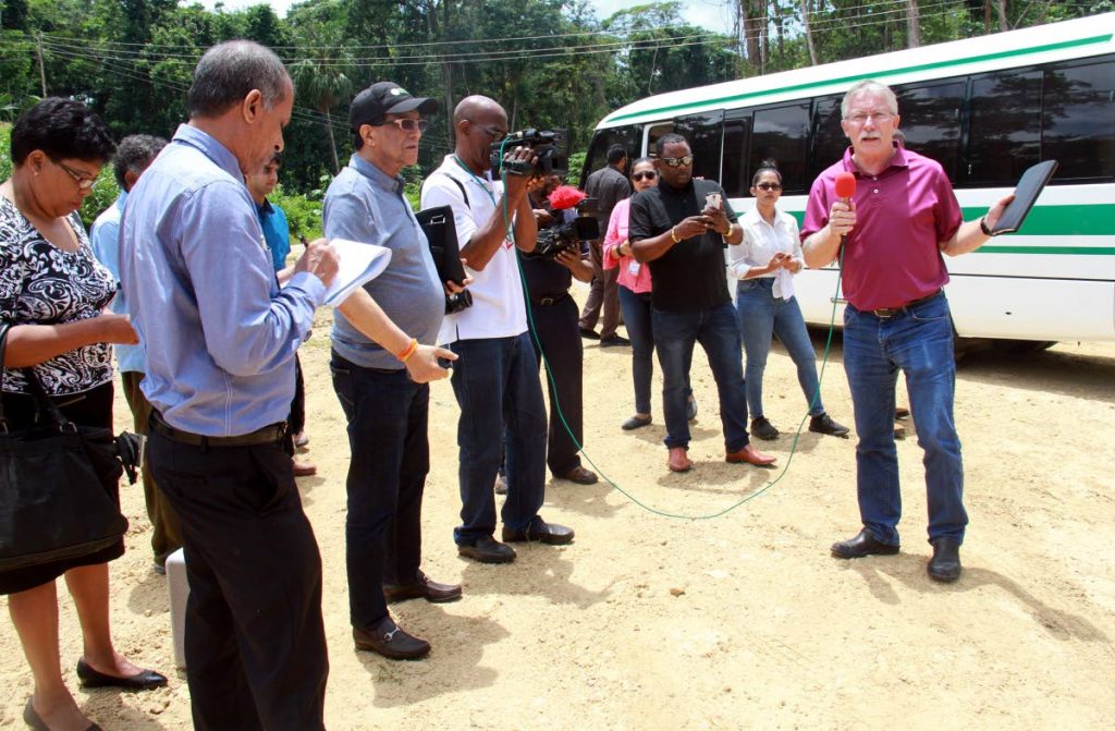 ON THE GROUND: Canadian oil expert Jim Krissa, right, speaks to journalists yesterday during a media tour of A&V facilities in  Moruga. PHOTO BY ANIL RAMPERSAD