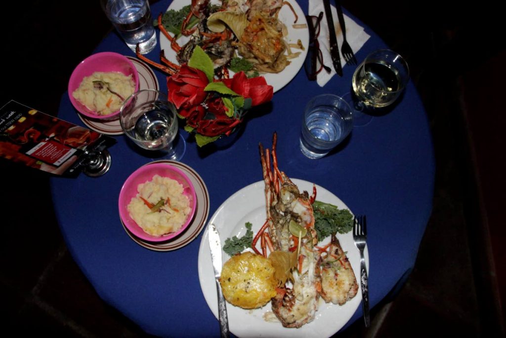 The lobster with garlic butter dish was a hit with diners enjoying the Restaurant Week menu at R& Taste of the Caribbean located at Sandy Point Beach Club Hotel, Crown Point.