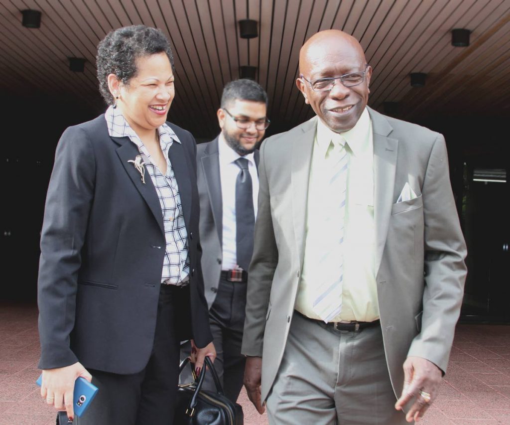 JACK TRUMPED: A smiling Jack Warner leaves the Hall of Justice, Port of Spain yesterday after losing an appeal for judicial review. Extradition proceedings can now go ahead against the former minister and FIFA vice president.