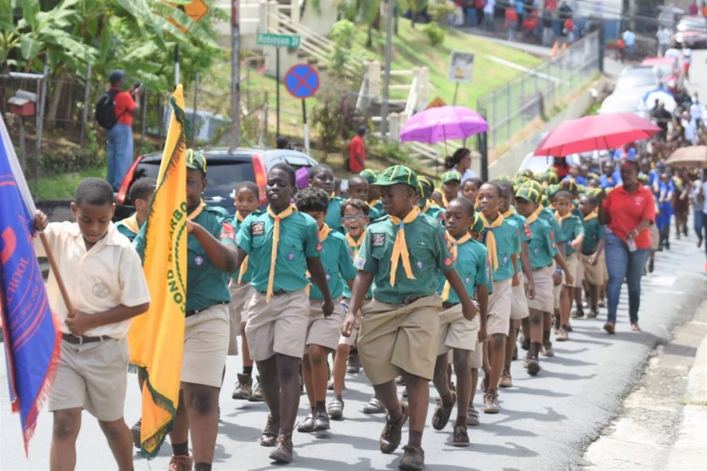 Cub scouts from the Scarborough RC Primary School participate in the march held by the school last Saturday to celebrate Trinidad and Tobagos 41st anniversary as a Republic.