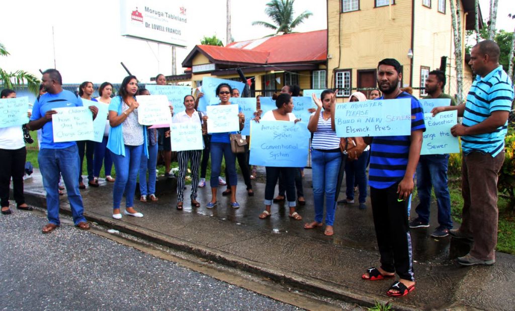 Parents of students attending the Elswick Presbyterian School in Tableland protest in front the offices of MP for Mourga/Tableland Dr Lovell Francis yesterday.