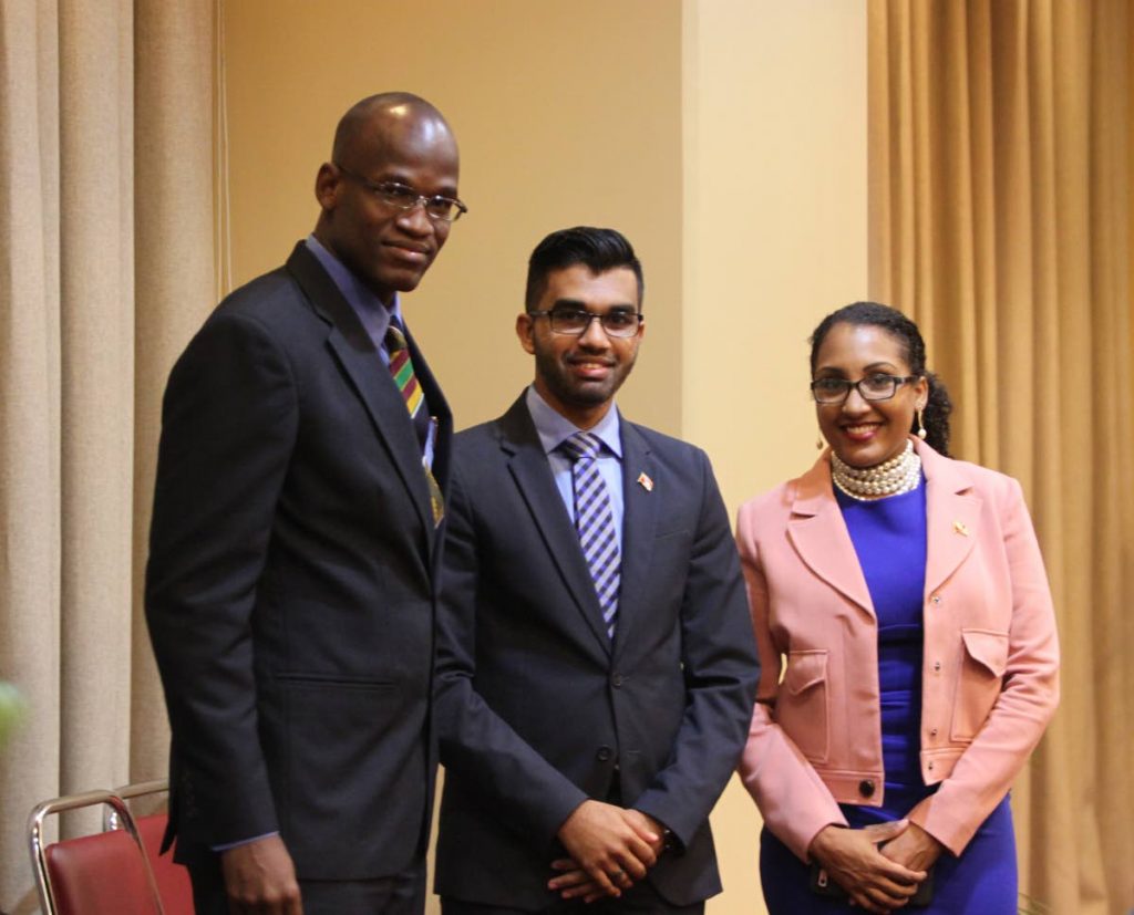From left, Taharqa Obika, Saddam Hosein and Anita Haynes, after they were sworn-in as Opposition Senators yesterday in the Upper House.