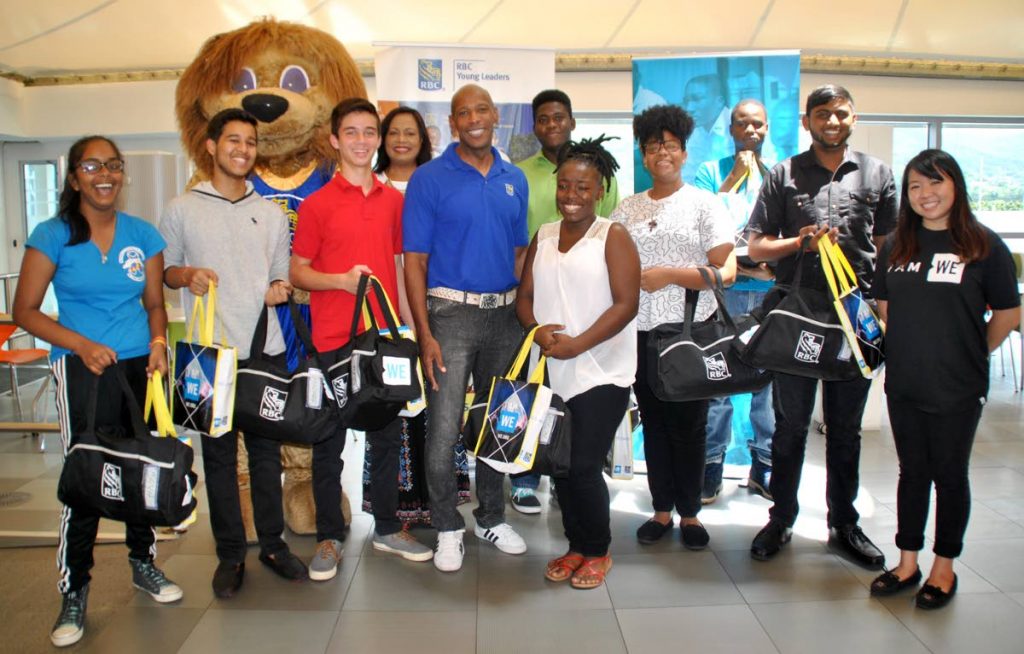 Darryl White (centre), Managing Director, RBC Royal Bank and Bugie Lo (right), Programme Manager, WE Schools (Caribbean), gave a royal send-off to RBC young leaders who participated in WE Day Toronto. Joining in the special occasion was Leo the Lion.