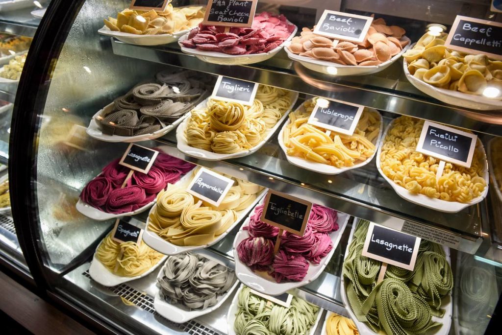 A variety of coloured pasta on offer.