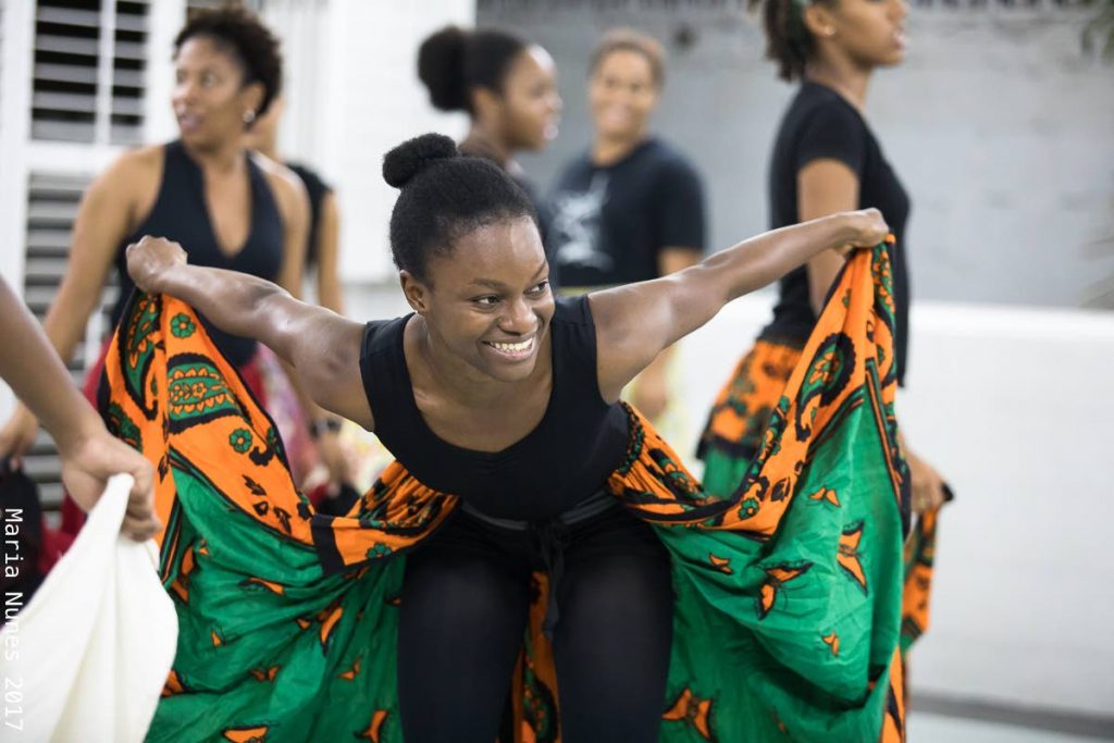 A dancer goes through her steps during 
rehearsals.