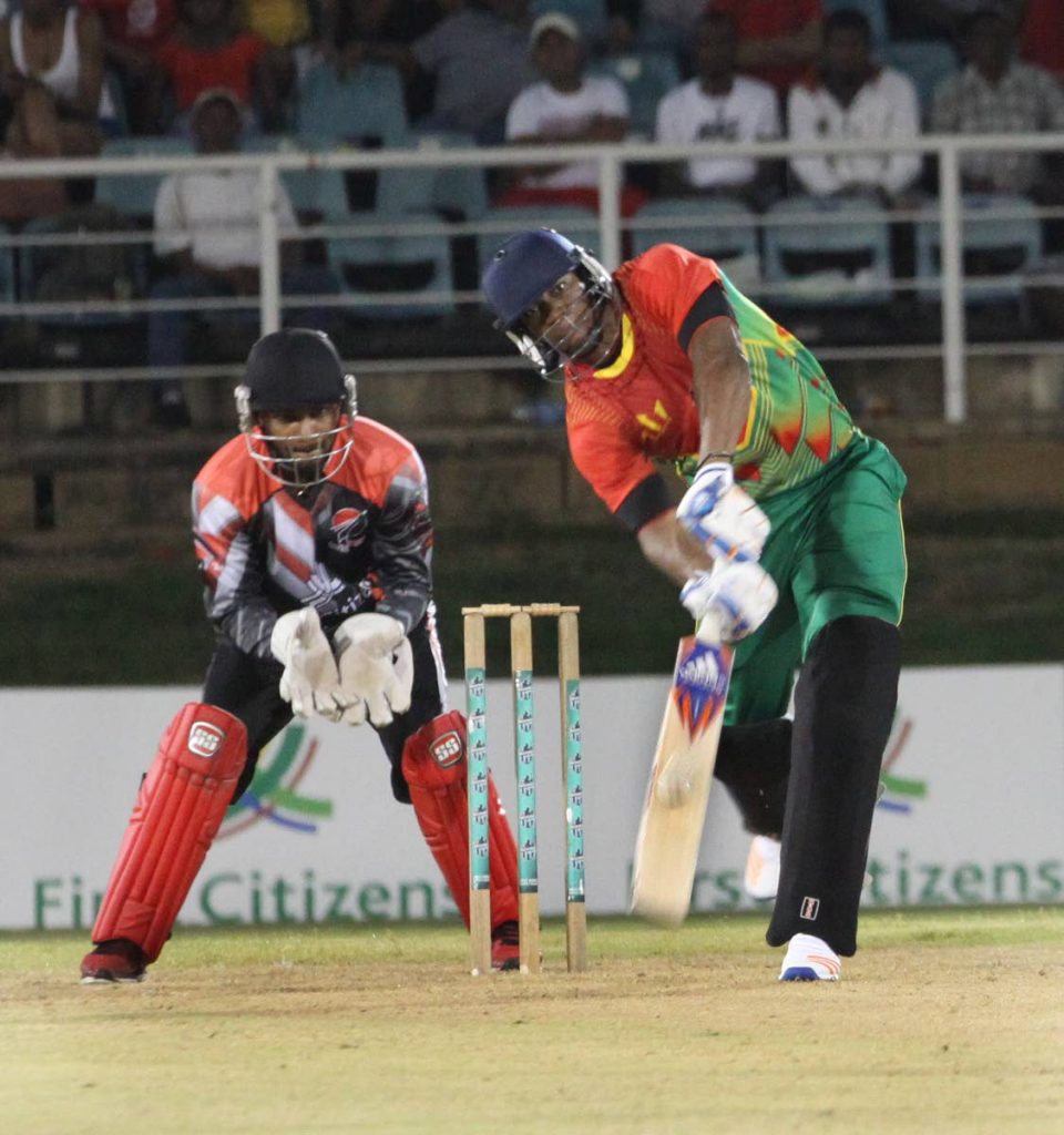 Caribbean Select XI batsman Yohan Blake looks to hit Red Force spinner Sunil Narine for six in Saturday night’s Hurricane Relief T20 at the Queen’s Park Oval, St Clair.