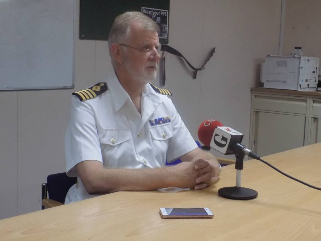 Commanding Officer of the RFA Mounts Bay, Captain Stephen Norrisspeaks with reporters after a brief tour of the vessel which provided aid in the wake of Hurricane Maria in Dominica.