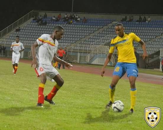 Defence Force winger Reon Moore, right, on the attack in a game earlier this season.