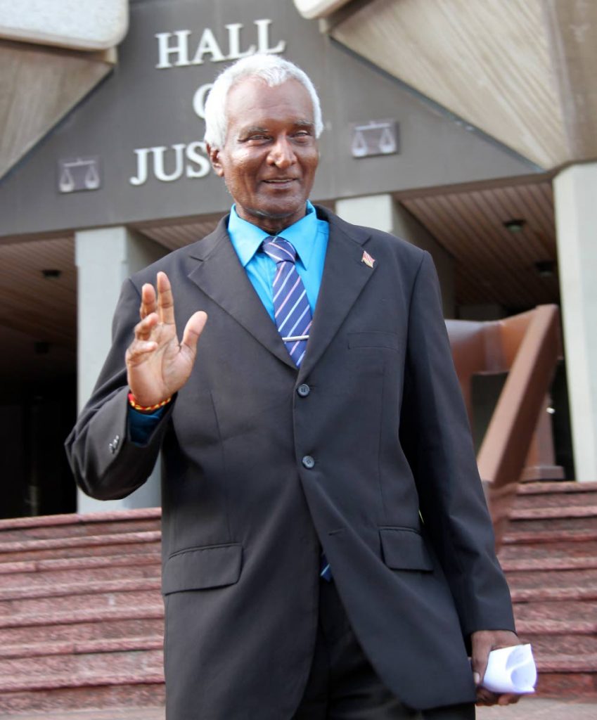 HAPPY: Siparia West Secondary School principal Sookoo Sonnylal leaves the Hall of Justice in Port of Spain yesterday.  PHOTO BY SUREASH CHOLAI