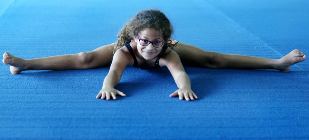 Seven year-old gymnast Jessie-Leigh Roberts-Riley shows her technique.