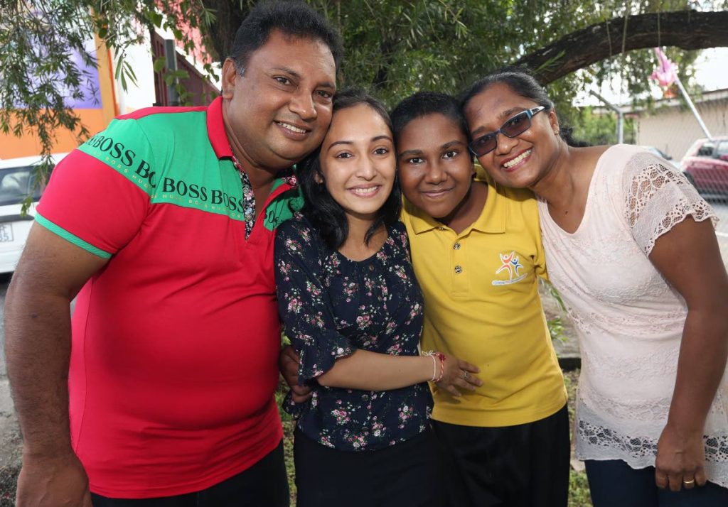 VESHALA’S FAMILY: From left, proud father Naarad, President’s Medal winner Veshala Goon, brother Shikar and mother Parbatee in a celebratory mood yesterday.
