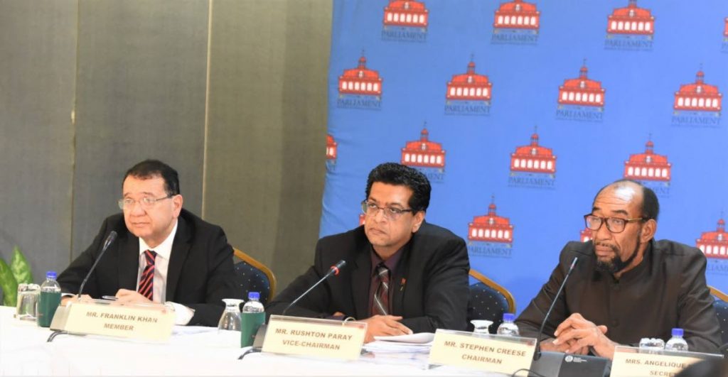 Independent Senator Stephen Creese, right, sits as chairman of the Joint Select Committee of Parliament on Land and Physical Infrastructure to inquire into the maintenance and procurement of the inter-island ferries, at a hearing in Scarborough on September 6.  At left is member, Franklyn Khan, and Vice-Chairman Rushton Paray. 