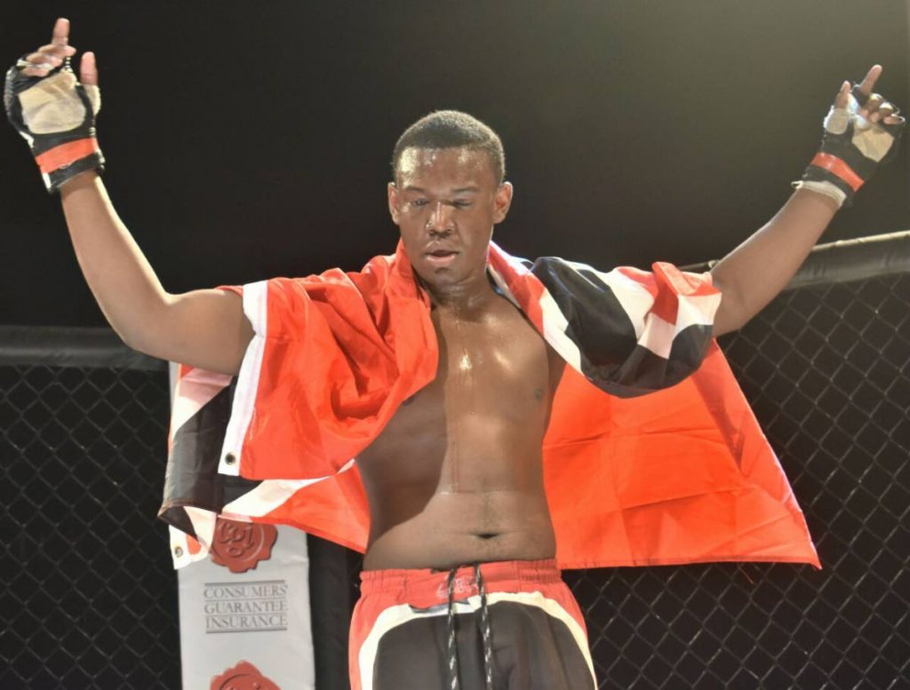 Trinidad and Tobago’s Brandon La Croix celebrates his MMA 
victory in Barbados on Friday night.