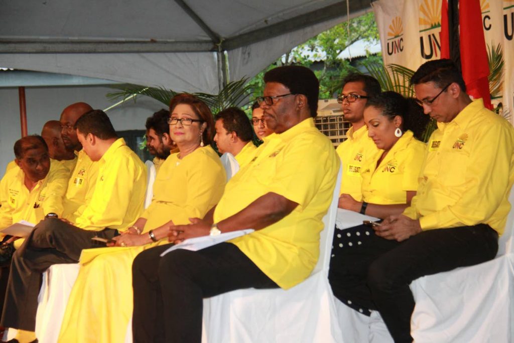 ELECTIONS APPROVED: Opposition leader Kamla Persad-Bissessar and other members of the UNC await the start of the party’s national congress held yesterday at the Shiva Boys’ Hindu College,Penal.