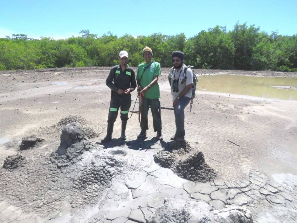 Some of the bioblitz team members on reconnaissance at a mud volcano near Icacos.
