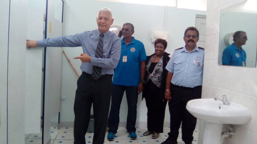 Port of Spain Mayor Joel Martinez and members of the Port of Spain City Council’s Health Department, tours washroom facilities at the newly renovated Promenade access facilities yesterday.