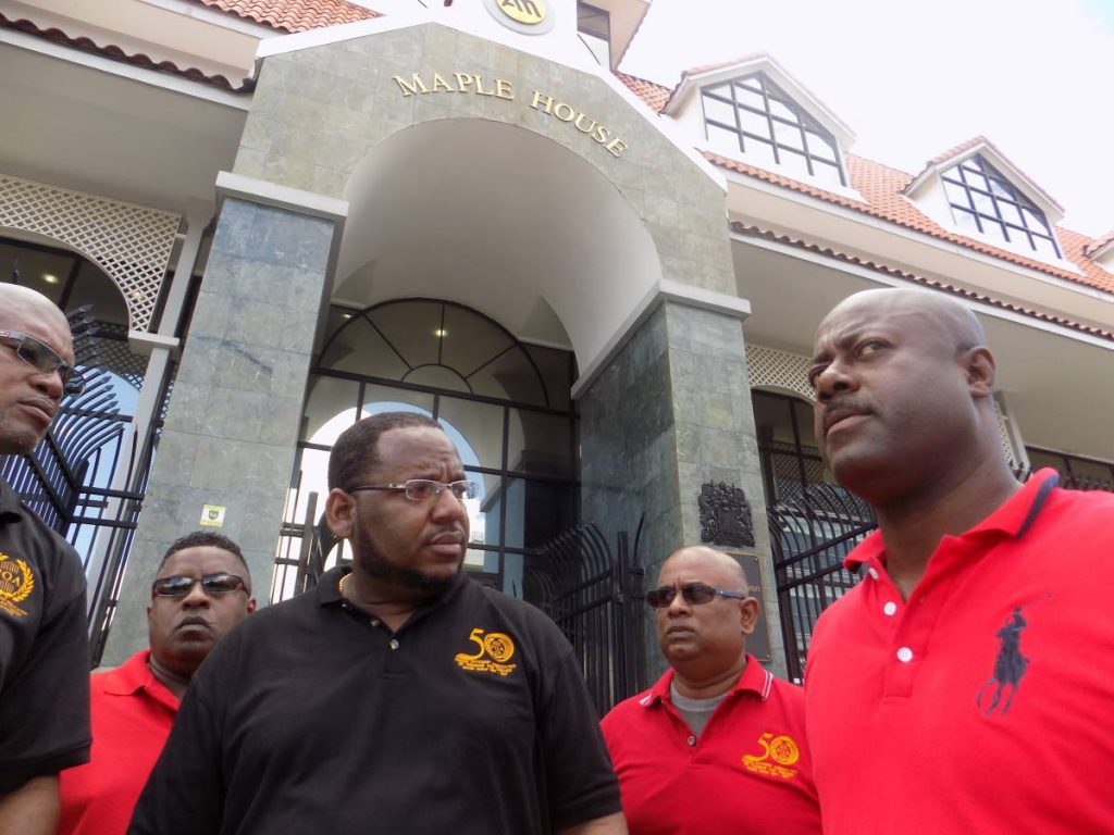Members of the Prison Officer Association (POA) and their families led by President General Ceron Richards (right) visited the Canadian High Commission yesterday to request asylum, as they said they no longer felt safe in Trinidad and Tobago. PHOTO BY SHANE SUPERVILLE
