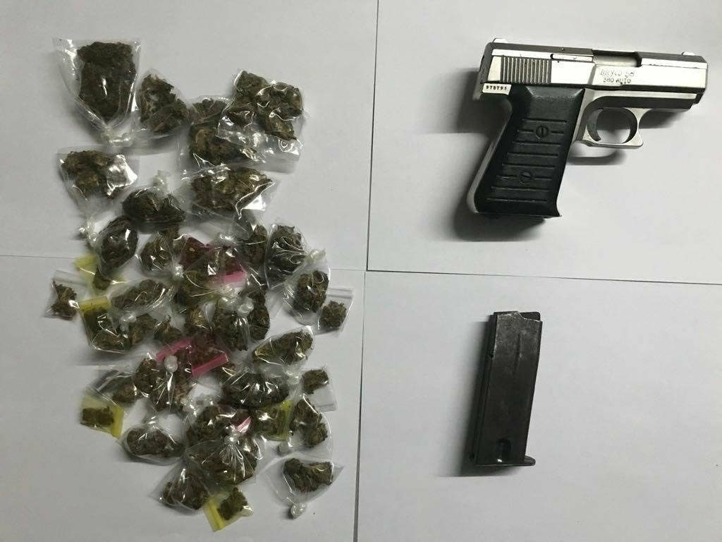 A firearm and drugs seized by police during exercises in Santa Cruz and Morvant. 