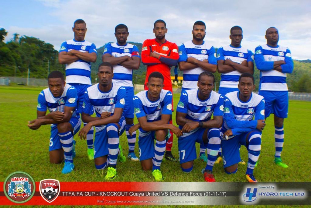 Members of Guyana United pose for a team photo prior to their Super League game against Defence Force recently.