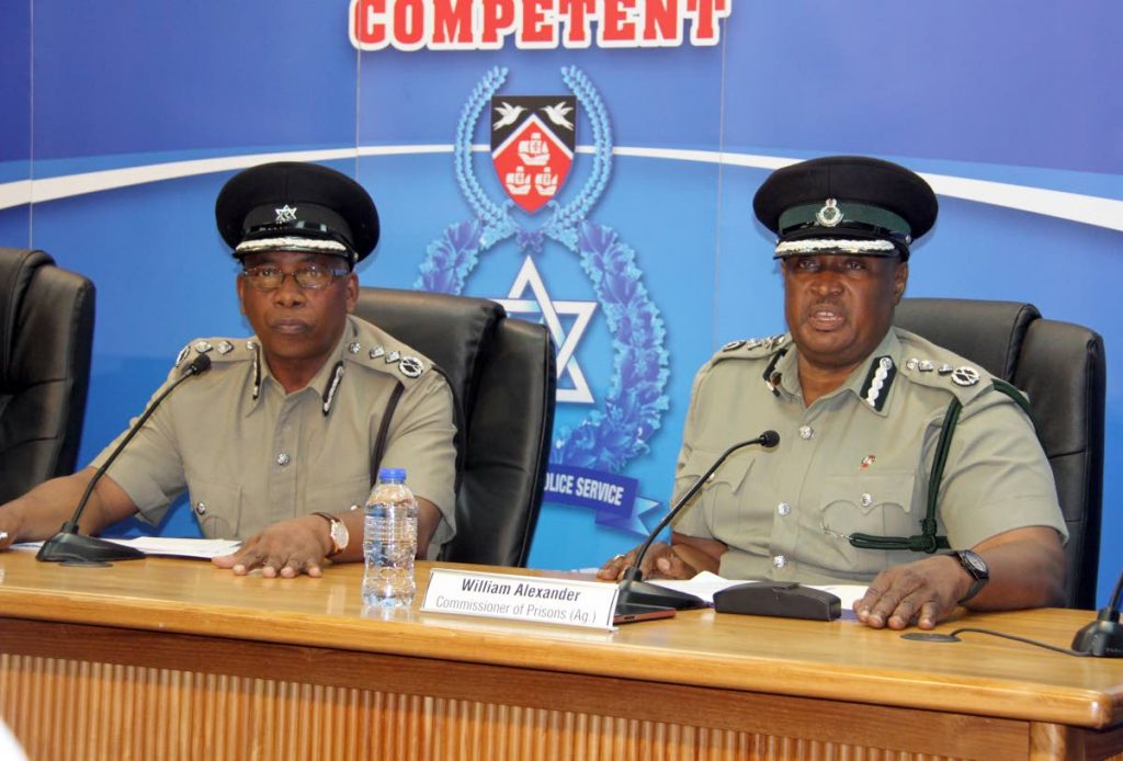 Commissioner of 
Prisons William Alexander, right, alongside Commissioner of Police Stephen Williams.  PHOTO BY SUREASH CHOLAI