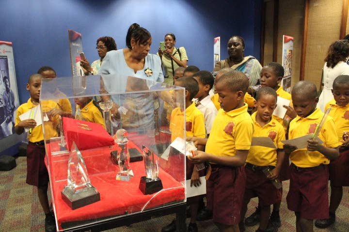 Pupils from the Richmond Street Boys Primary School at the opening of the Crawford Commemorative Exhibition at Nalis on Tuesday.
