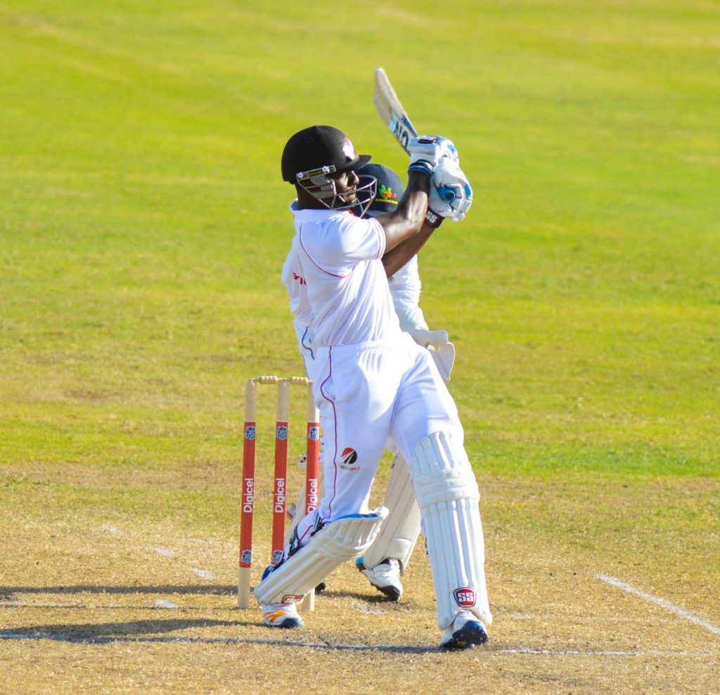 Trinidad and Tobago’s Ewart Nicholson pulls a delivery to the boundary against Barbados Pride in a regional four-day round one match at  Kensington Oval, Barbados.