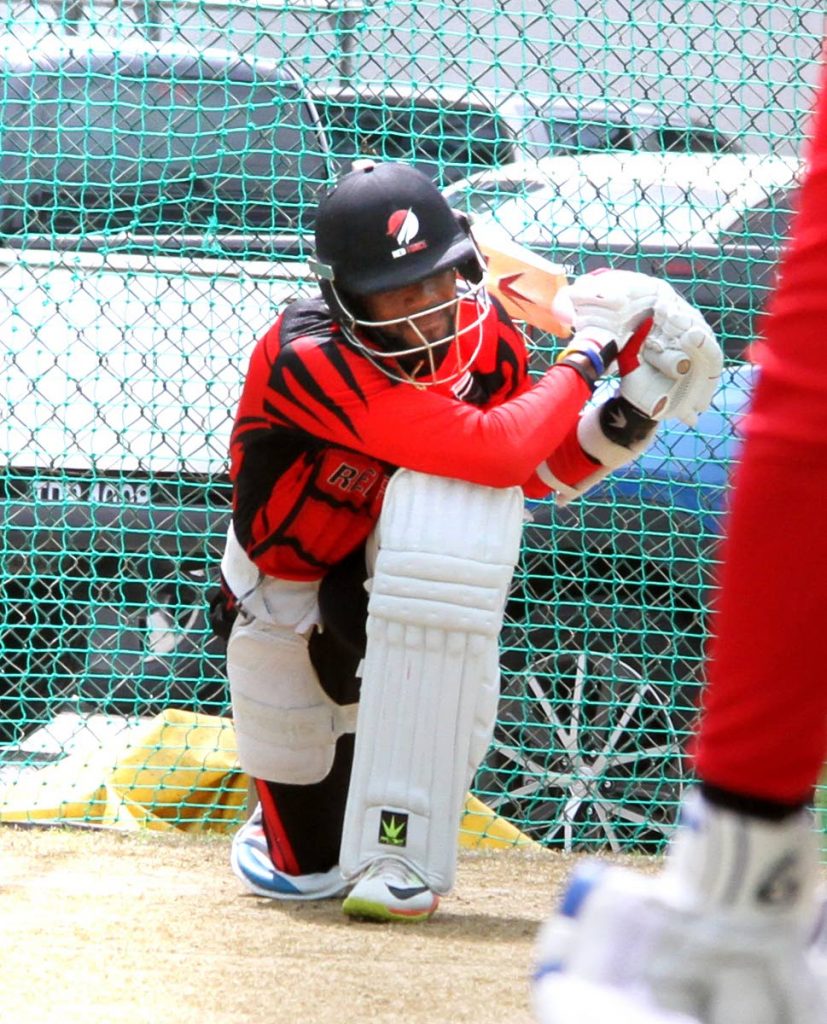 Former Red Force captain Kyle Hope plays a sweep shot during a training session yesterday at the Queen’s Park Oval, St Clair.