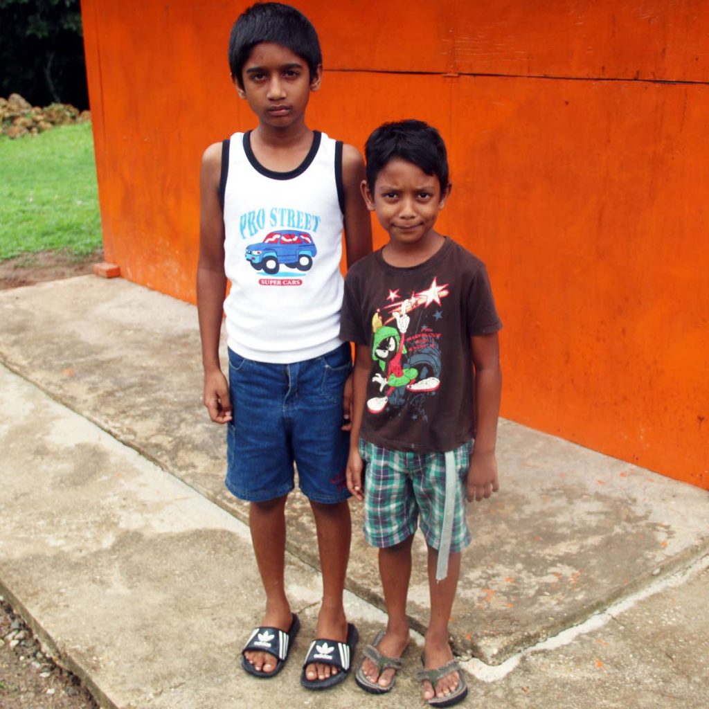 From left, Brandon Roopnarine, 9, and his brother Darrion, 5.