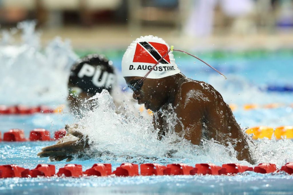 Derelle Augustine during his gold medal swim in the Boys 11-and-Over 100-metre breastroke B final on Sunday. PHOTO BY ALLAN CRANE/CA-IMAGES