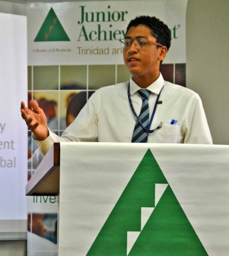 Queen’s Royal College student Kai-Jeevan Kalideen leads off the debate for his school in Round 3 of the Junior Achievement Leadership Debate Series 2017 on Friday.