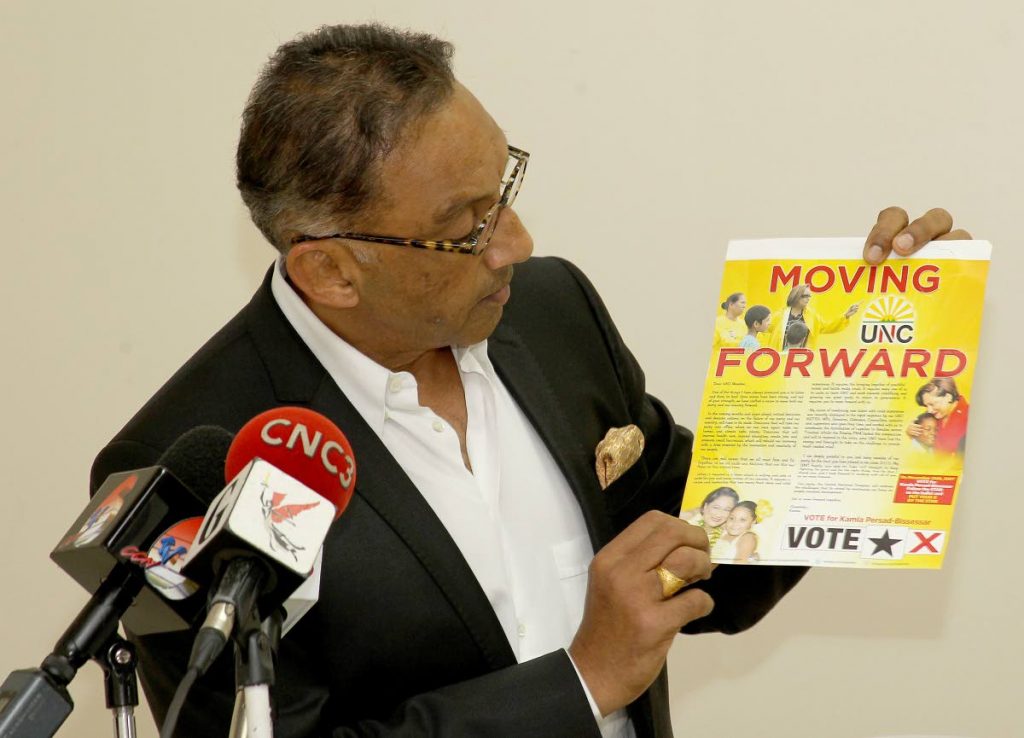 MASH BRAKES: Vasant Bharath displays a pamphlet at a press conference yesterday where he announced he was withdrawing from the UNC election race. PHOTO BY LINCOLN HOLDER