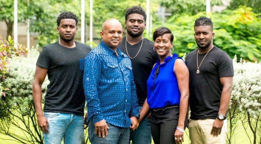 FAMILY MAN: PNM Councillor for Belmont Darryl Rajpaul, who died on Saturday night, is seen with his wife Perlin and their three sons.