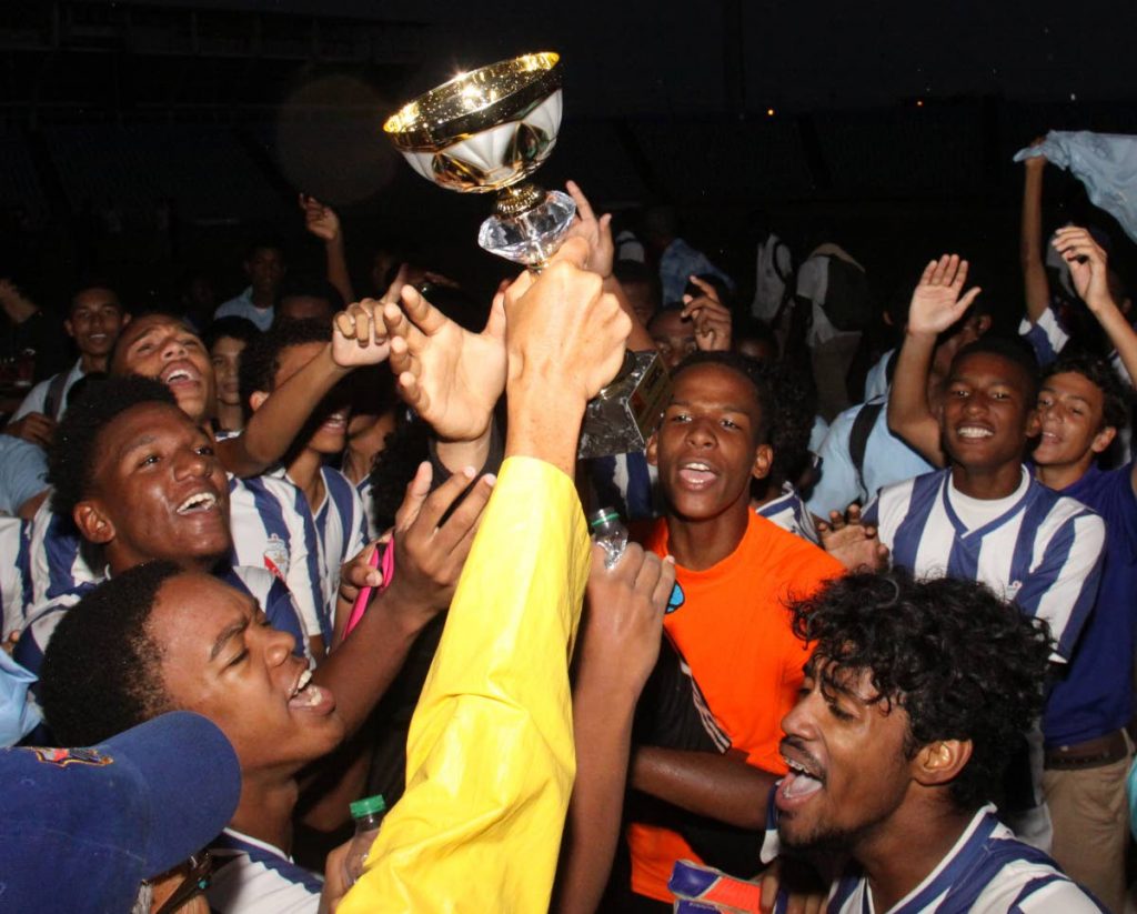 SWEET VICTORY: St Mary's College football players celebrate after defeating St Anthony's College 1-0 at the Coca Cola North Zone Intercol final at the Hasely Crawford Stadium yesterday.