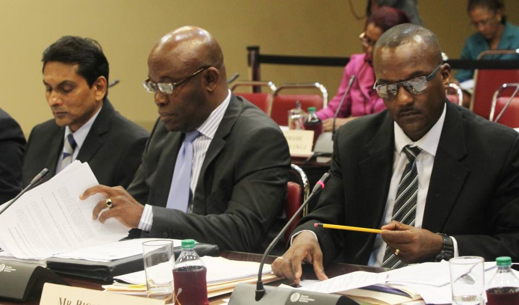 NO GAMBLE HERE: NLCB heads, from left, director Michael Jogee, chairman Marvin Johncilla and deputy director Ricardo Borde at a JSC meeting yesterday at the Parliament Tower in Port of Spain. PHOTO BY RATTAN JADOO