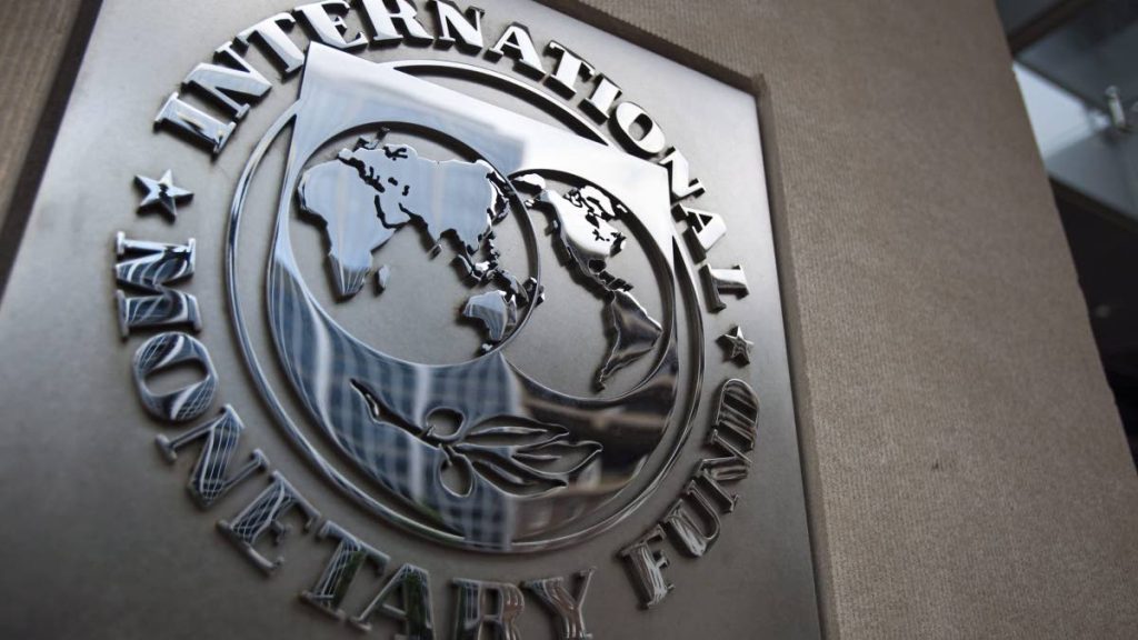 The sign of the International Monetary Fund is seen at the entrance of the Headquarters of the IMF, also known as building HQ2, in Washington, DC, USA, on 18 May, 2011.  EPA/JIM LO SCALZO. PHOTO COURTESY THE FINANCIAL TIMES.