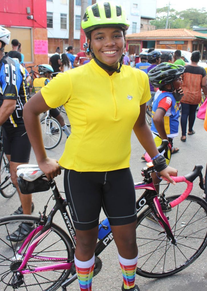 Danieyelle Benett poses with her bike in Sangre Grande last weekend during a ride from Tacarigua to Salybia to raise awareness about child obesity.