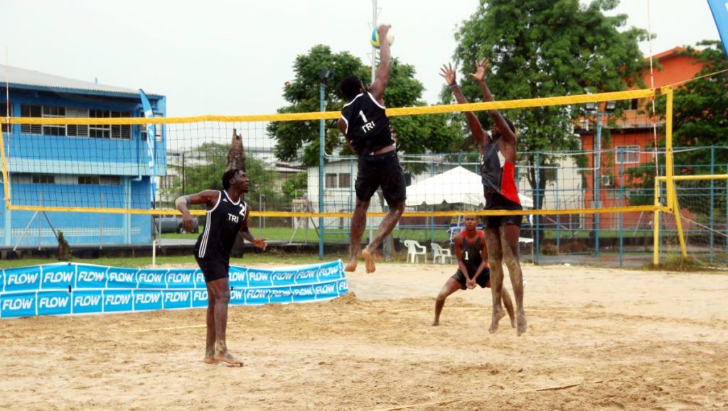 Action in the Flow Beach Volleyball League on Sunday at Saith Park, 
Chaguanas.