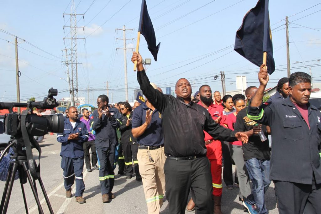 NP workers protest outside their workplace at Sea Lots, Port of Spain, calling on management to meet with them to discuss several issues.
