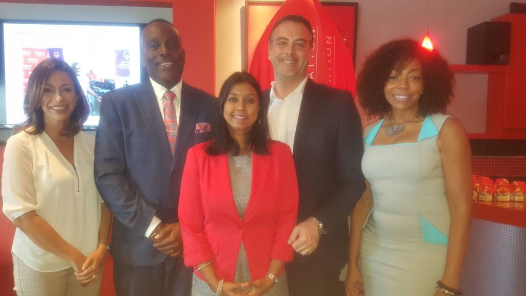 Sacha Thompson, Digicel chair, left, deputy house speaker Esmond Forde, new Digicel Foundation chair Desha Clifford, John Delves, CEO Digicel Trinidad and Penny Gomez, CEO Digicel Foundation.