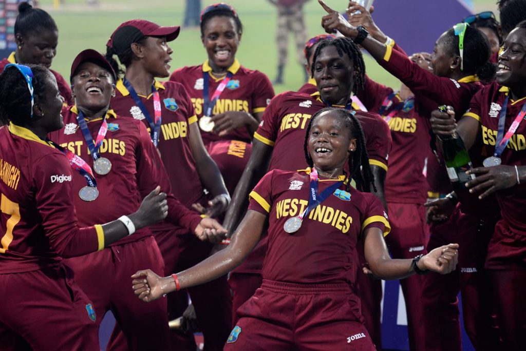 West Indies women’s team celebrate the ICC World T20 title last year in India.