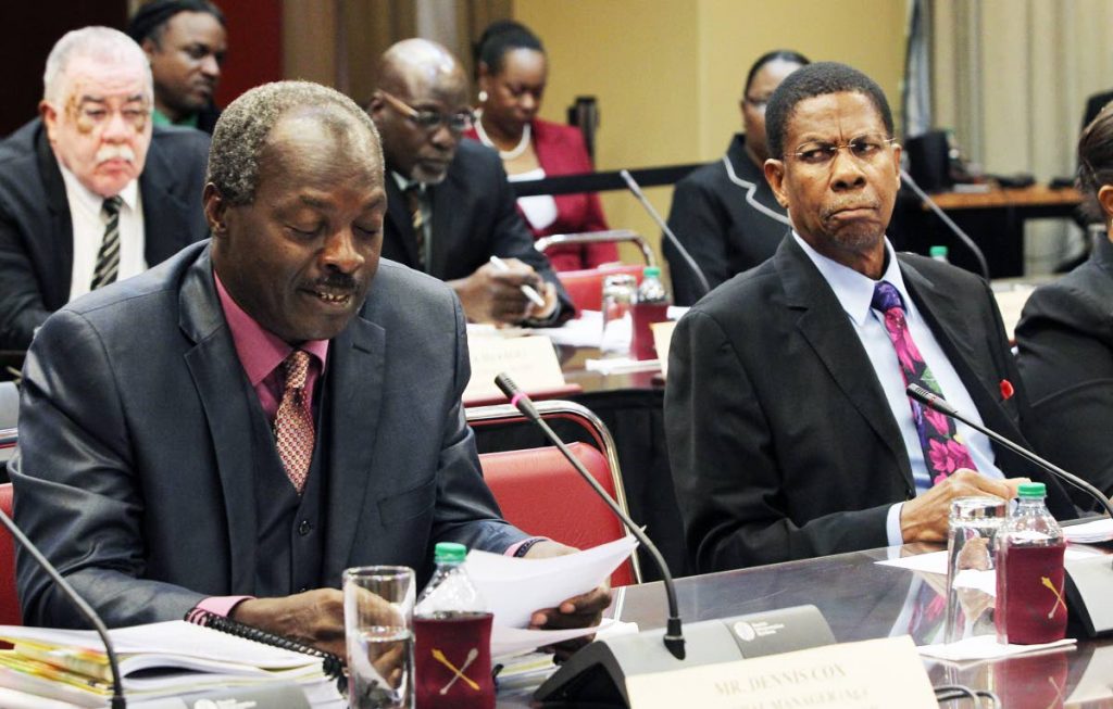 Flashback: Former chairman of the Education Facilities Company Ltd (EFCL) Arnold Piggott, right, looks quizzically at chairman Dennis Cox during the sitting yesterday of the Joint Select Committee at the Parliament Tower, Port of Spain. PHOTO BY RATTAN JADOO.