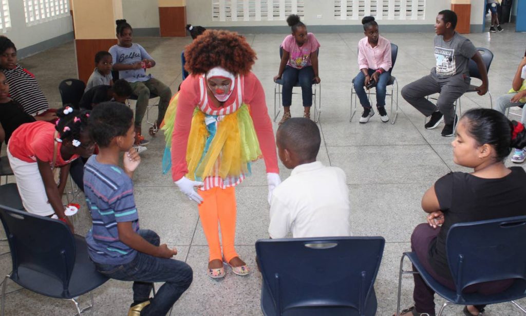 Engenia Lemo entertains pupils at A Clowny Christmas show.