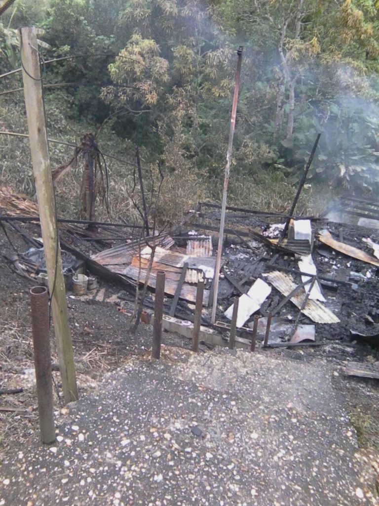 BURNT HOUSE: The charred remains of Gail Baptiste’s burnt out house at Guapo Village, Point Fortin