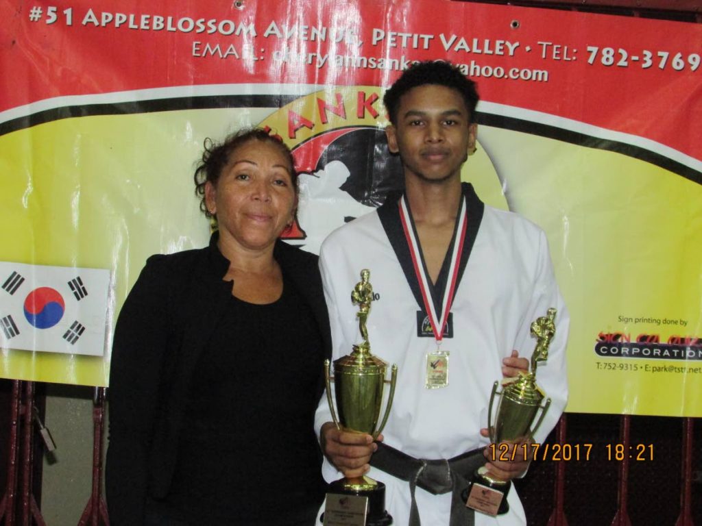 Stefan Biput (right) with his coach Cheryl-Ann Sankar